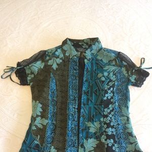 New York City sheer top with black shell.  Size S